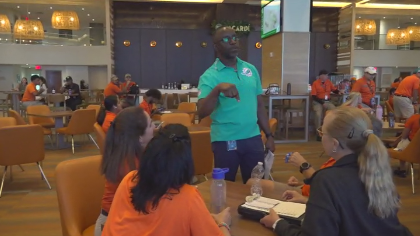 Miami Dade College professor finds his passion with side job at Hard Rock Stadium — CBS Miami, Clermont Arts news